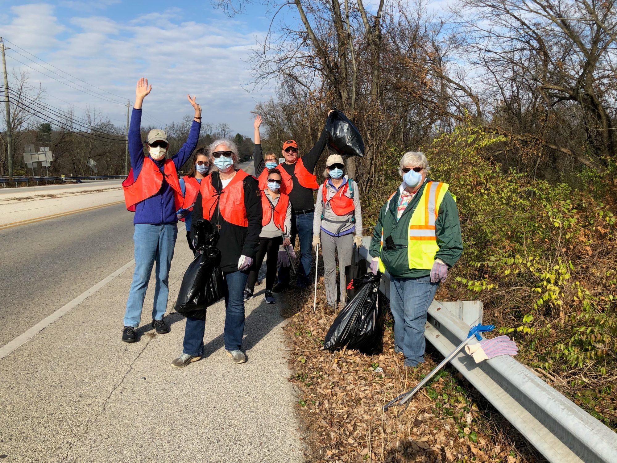 Barclay friends employess clean up highway