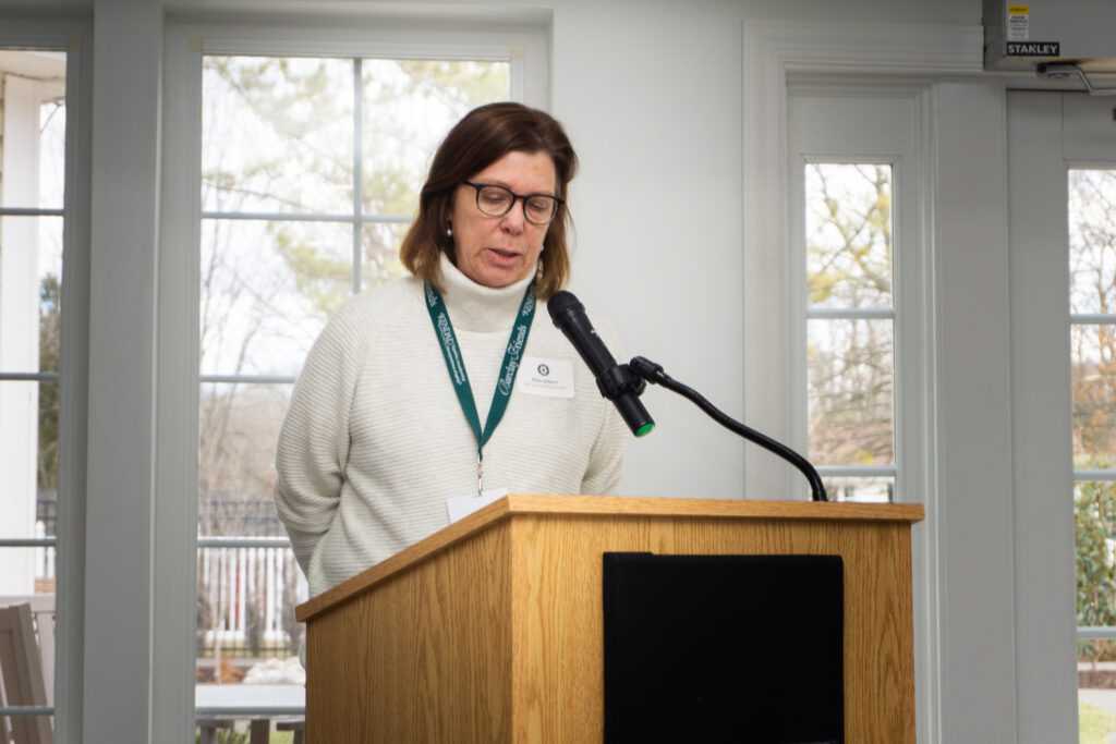 Ellen Gilbert speaks at the ribbon cutting event for the Goshen Memory Care neighborhood at Barclay Friends.